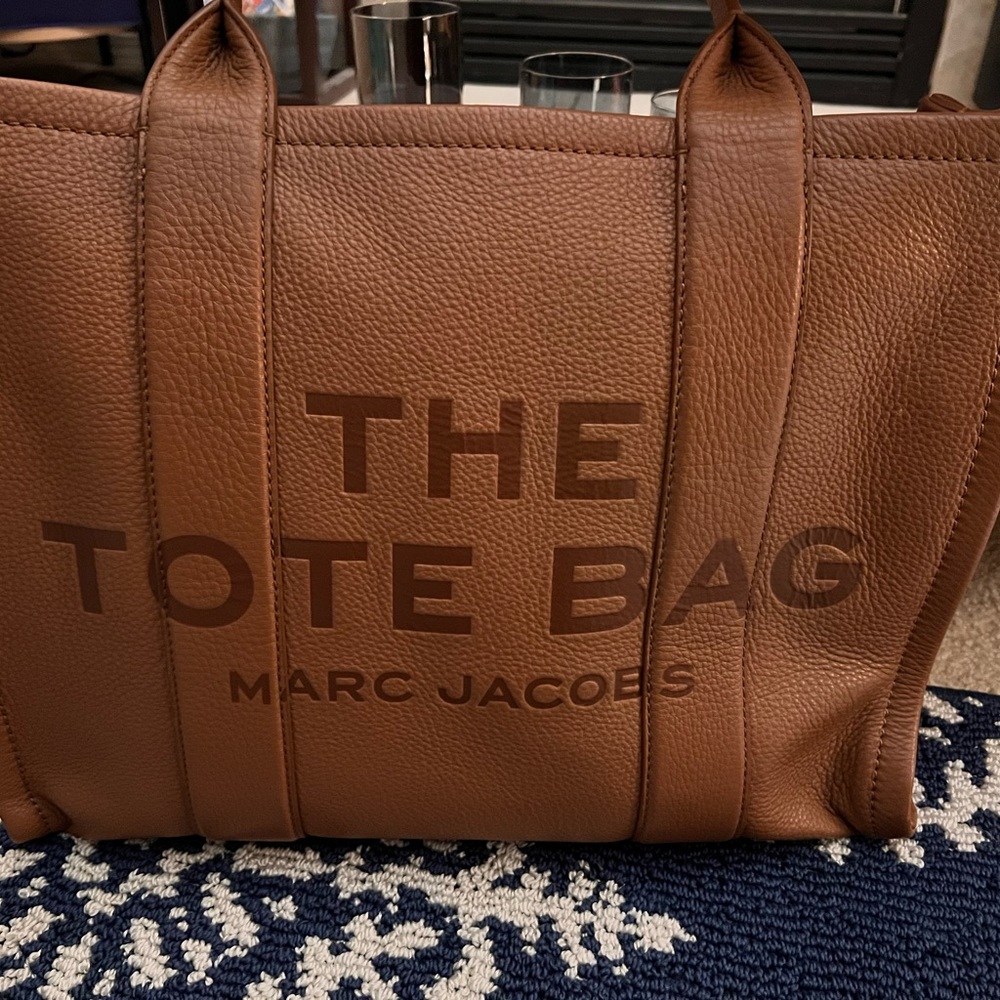 Marc Jacob’s brown leather traveler tote